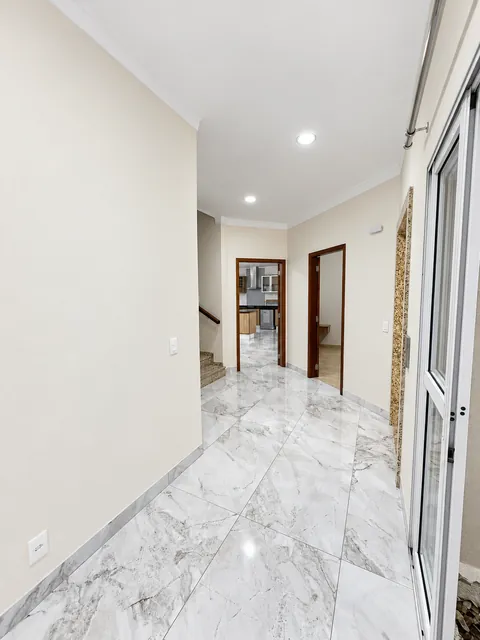 Circulação do pavimento térreo, casa à venda no Condomínio Magnólias I em Araraquara