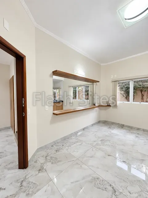 Sala com passa pratos, casa à venda no Condomínio Magnólias I em Araraquara